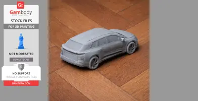 3D-printed model of a Faraday Future FF 91 car on a wooden surface.