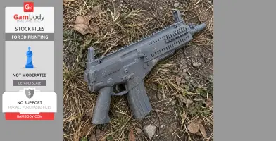A realistic 3D-printed Beretta ARX160 prop lying on grass and dirt.