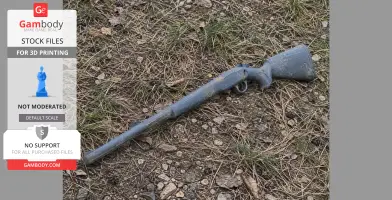 A 3D-printed break-action rifle prop lies on grassy ground.