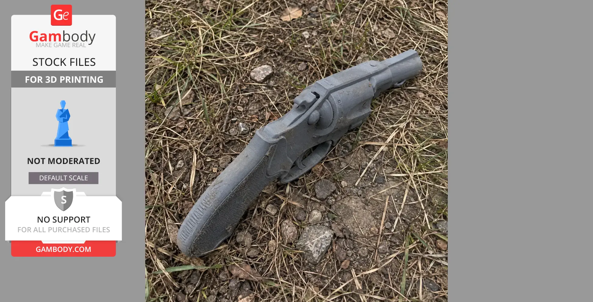Gray 3D-printed Colt Detective Special prop lying on grassy, rocky ground.