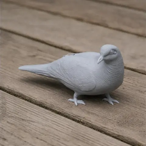 A detailed 3D printed model of a barred cuckoo-dove on a wooden surface.