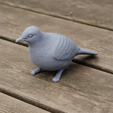 3D-printed barred dove model with detailed feathers on wooden surface.