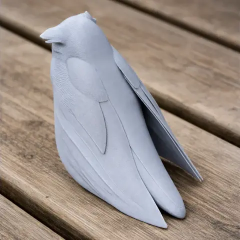 Sleek 3D model of a streamlined, head forward bird figure with elongated wings and smooth surface.