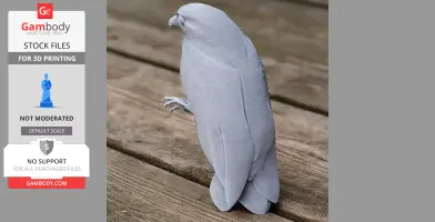 A gray 3D printed model of a barred owlet-nightjar standing on a wooden surface.