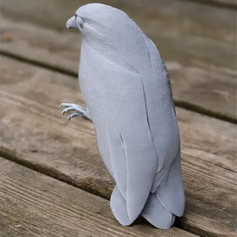 A detailed 3D model of a bird perched on wooden planks, designed for 3D printing.