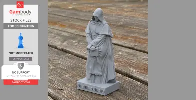 3D printed bust of a cloaked figure holding a book, standing on a wooden surface.