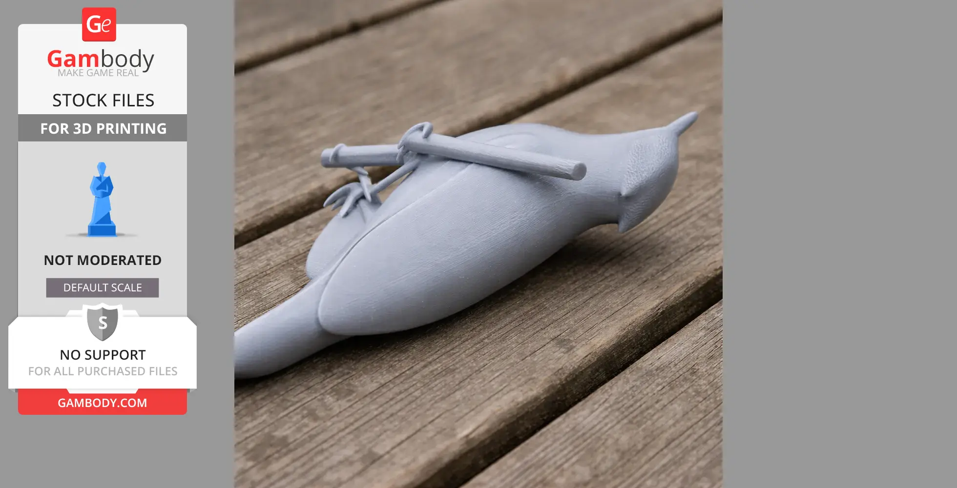 A 3D printed model of a bird lying on a wooden surface.