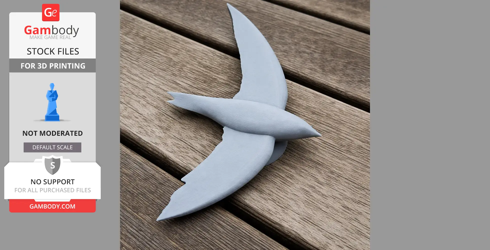 Gray 3D-printed model of a prehistoric bird with outstretched wings, resting on wooden panels.