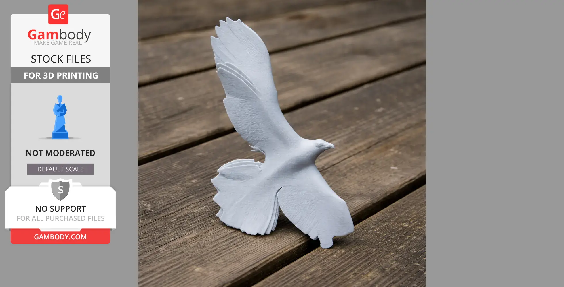 A 3D printed model of a bird with outstretched wings, placed on a wooden surface.