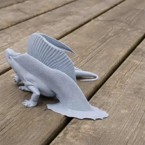 3D printed Bathygnathus model with textured sail-like fin sitting on a wooden surface.