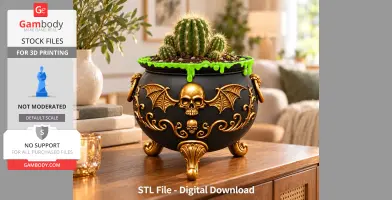 A decorative black cauldron with golden skull and bat details, holding cacti and green slime on top.