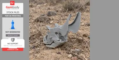 3D printed Judiceratops skull replica placed on rocky ground.