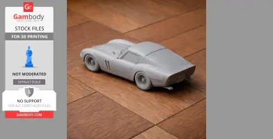 3D printed model of a Ferrari 250 GTO on a wooden surface, rear-side view.