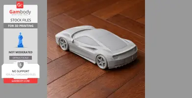 Gray 3D-printed model of a Ferrari 488 GTB on a wooden floor.