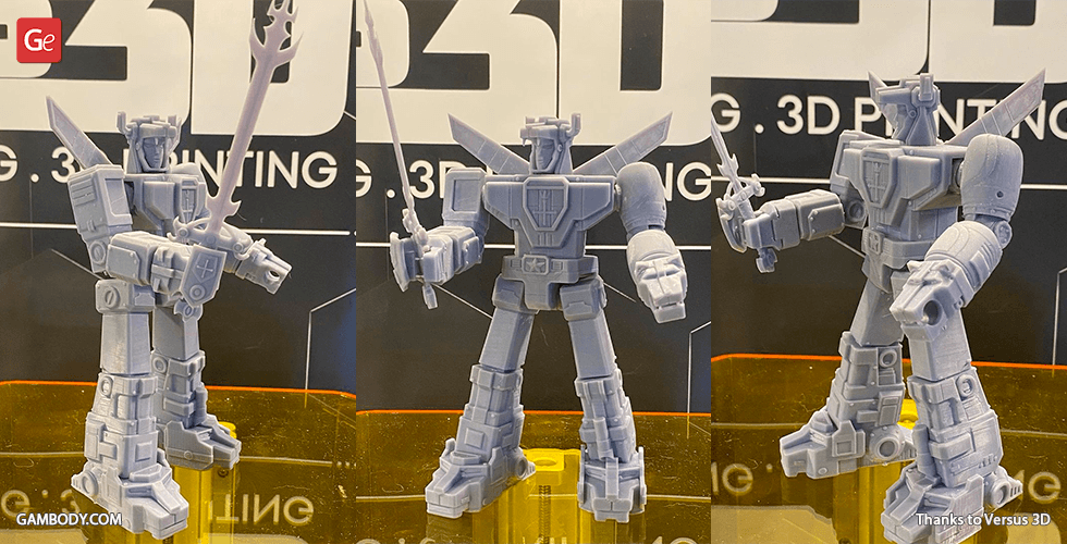 3D printed model of Voltron, a robot with large sword and intricate details, in various poses.