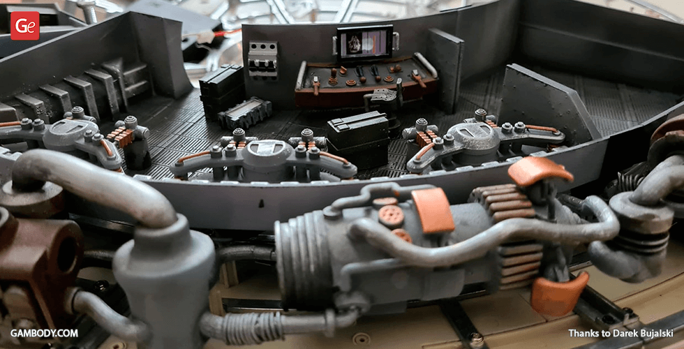 A detailed 3D-printed model of the Millennium Falcon's interior with complex machinery and control panels.