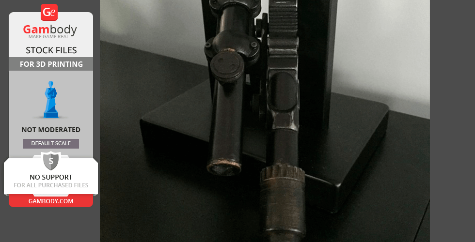 A 3D-printed model of a sci-fi blaster gun displayed on a stand.