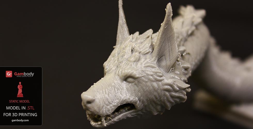 3D-printed model of a snarling mythical creature's head with detailed fur and sharp ears.