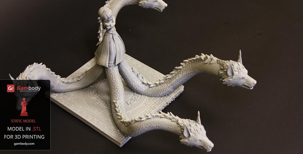A multi-headed serpent creature poised on a base, ready for 3D printing.