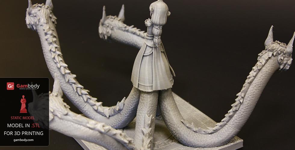 A 3D printed model of a figure with multiple dragon-like serpentine heads and a central humanoid form.