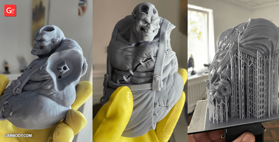 A detailed 3D printed model of a muscular, menacing character from Diablo IV, with support structures.