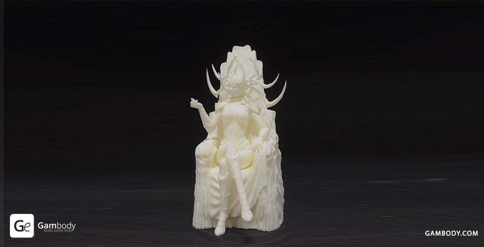 A 3D printed figure of a character seated on a throne with intricate headpiece and detailed attire.