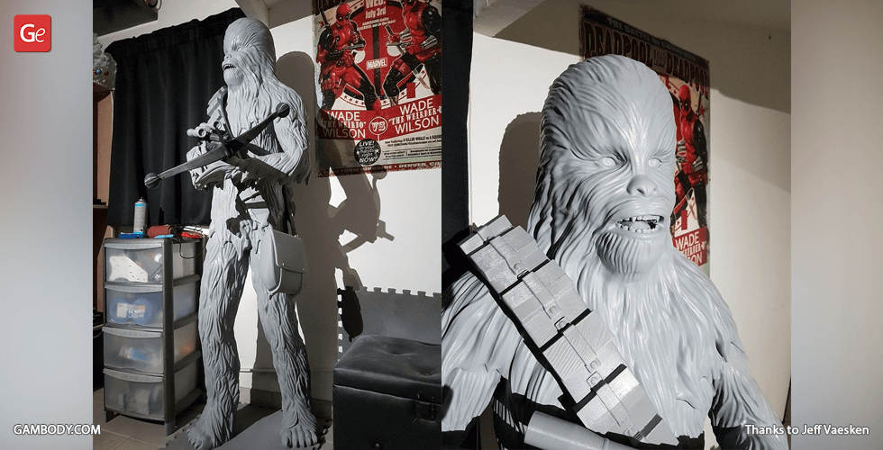 A detailed 3D-printed Chewbacca model, holding a weapon and wearing a bandolier.