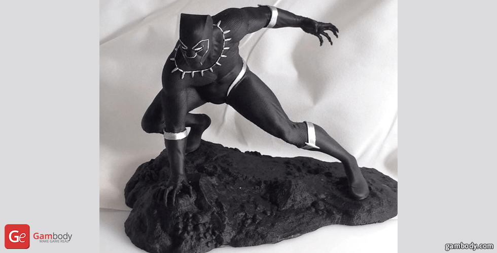 A dynamic Black Panther 3D model posed crouching on a rocky base, ready for 3D printing.