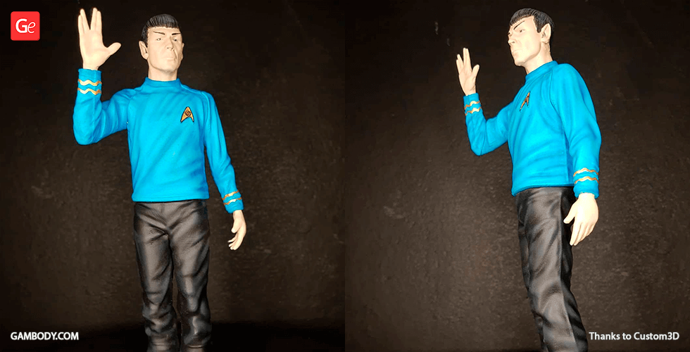 3D model of a character in a blue uniform, giving a Vulcan salute with one hand raised.